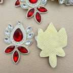 Front and back view of ruby red rhinestone patch showing ivory mesh base