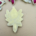 Back view of fuchsia rhinestone patch showing ivory mesh base