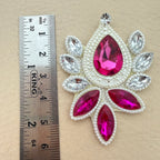 Fuchsia rhinestone patch with ruler showing size approximately 6.5cm
