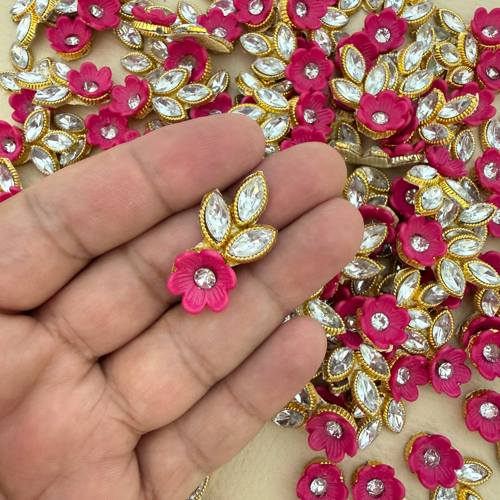 Back view of pink flower and leaf applique patch showing the fabric backing