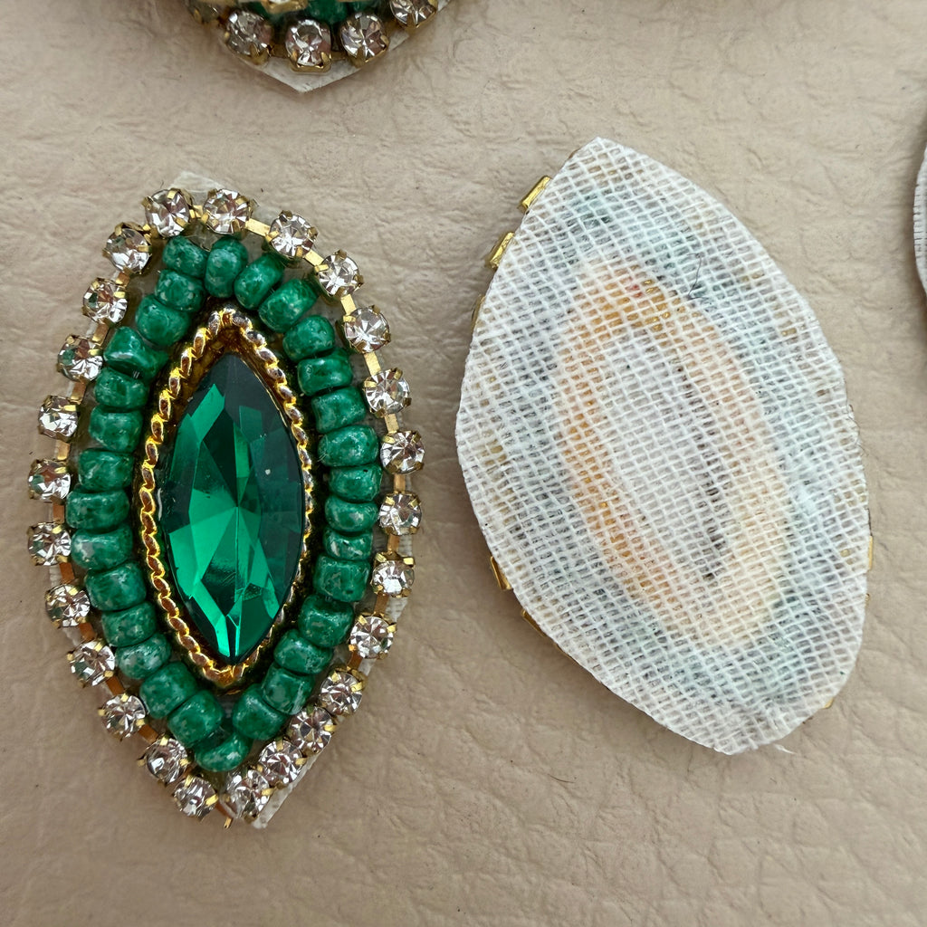 Collection of emerald green marquise crystal rhinestone patches with green beadwork
