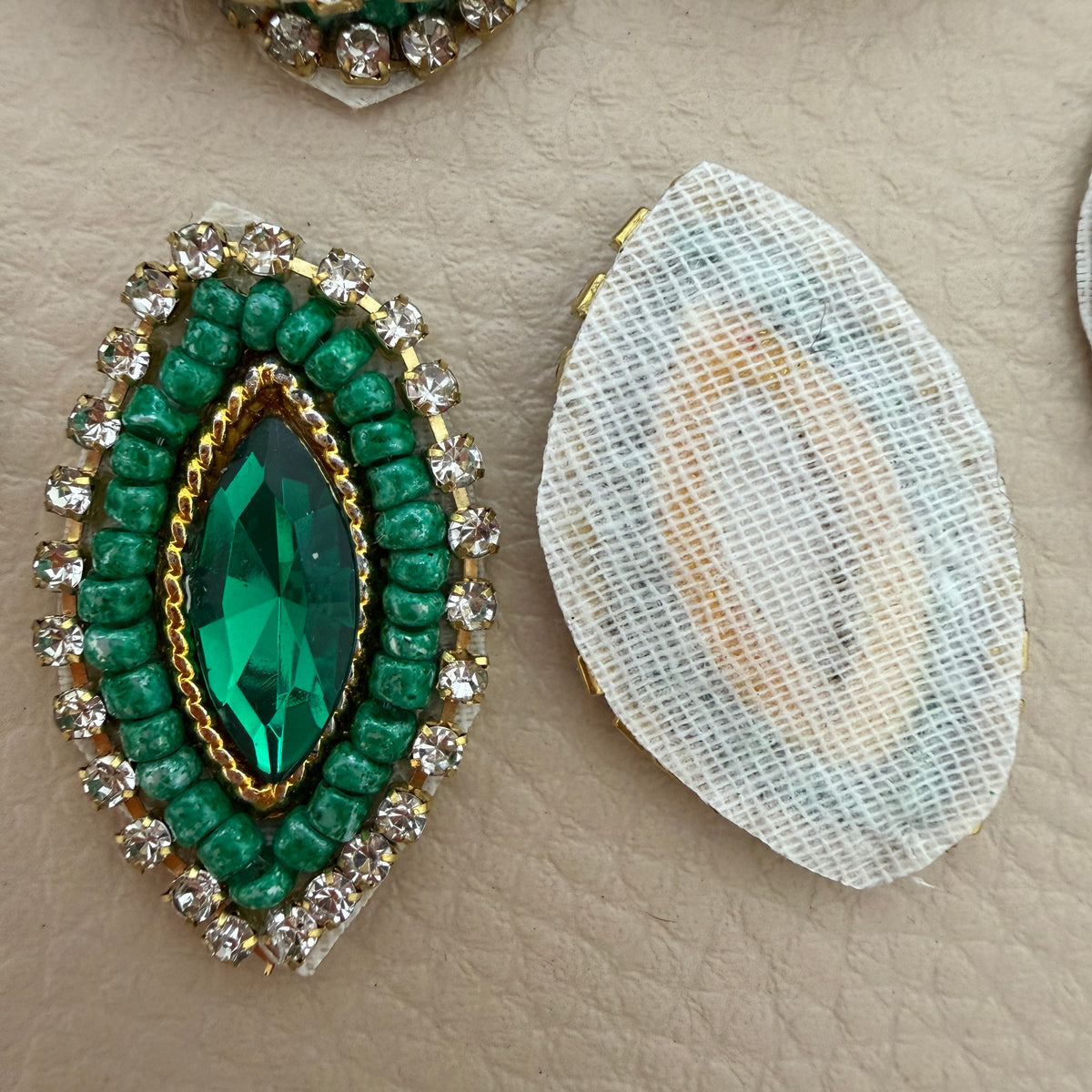 Collection of emerald green marquise crystal rhinestone patches with green beadwork