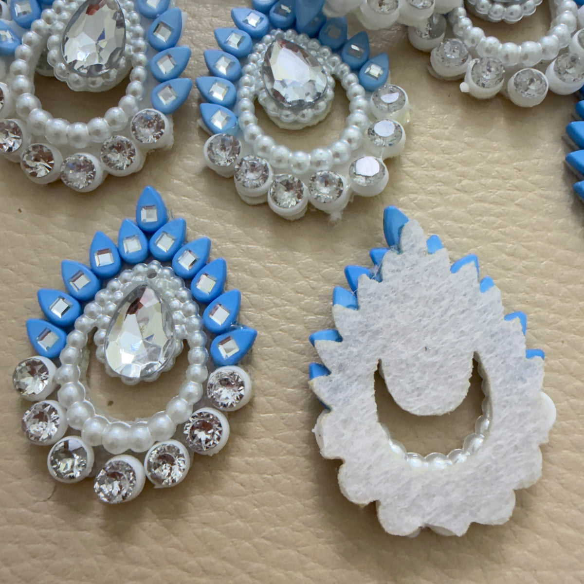 Sky blue and white pearl rhinestone appliques detail