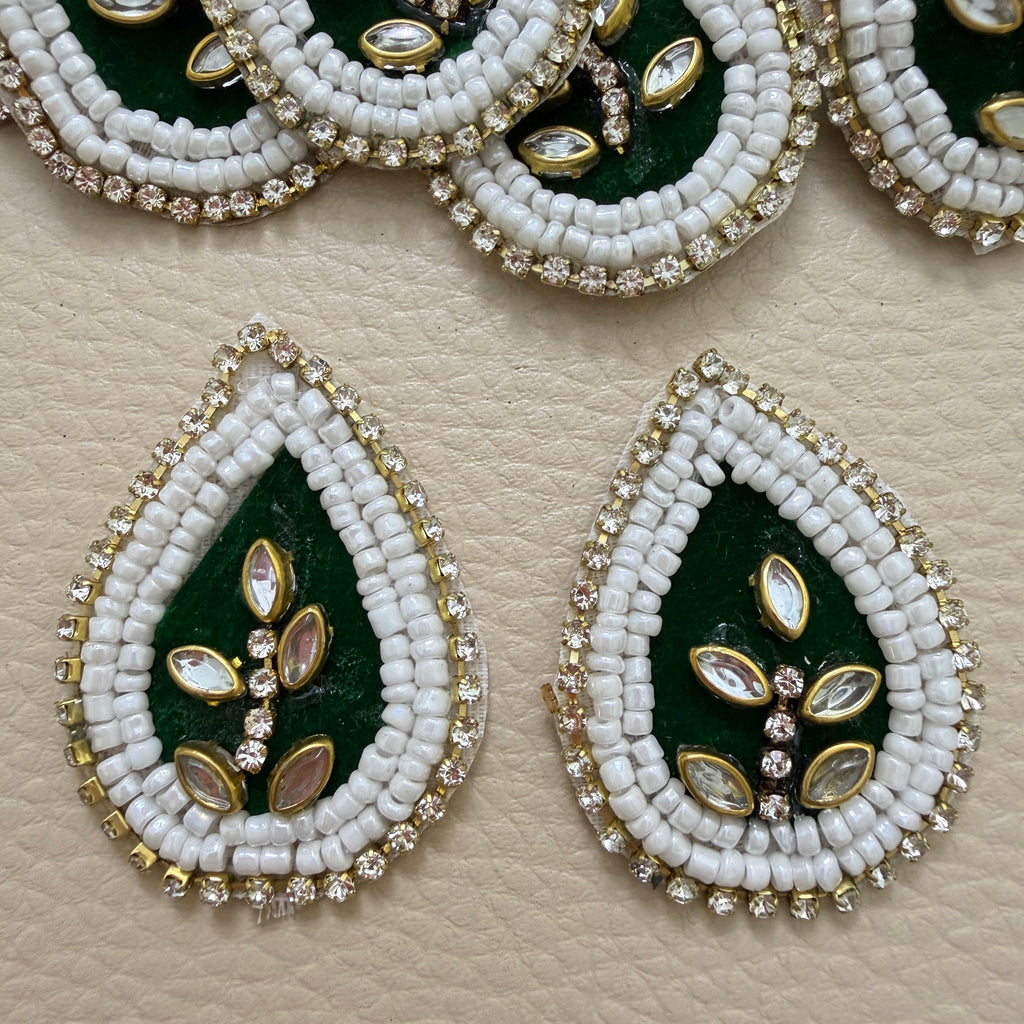 Front and white mesh back of bottle green beaded kundan patch