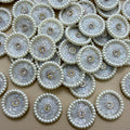 Pile of white pearl bugle bead round motif patches