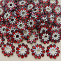 Pile of maroon rhinestone pearl flower motif patches