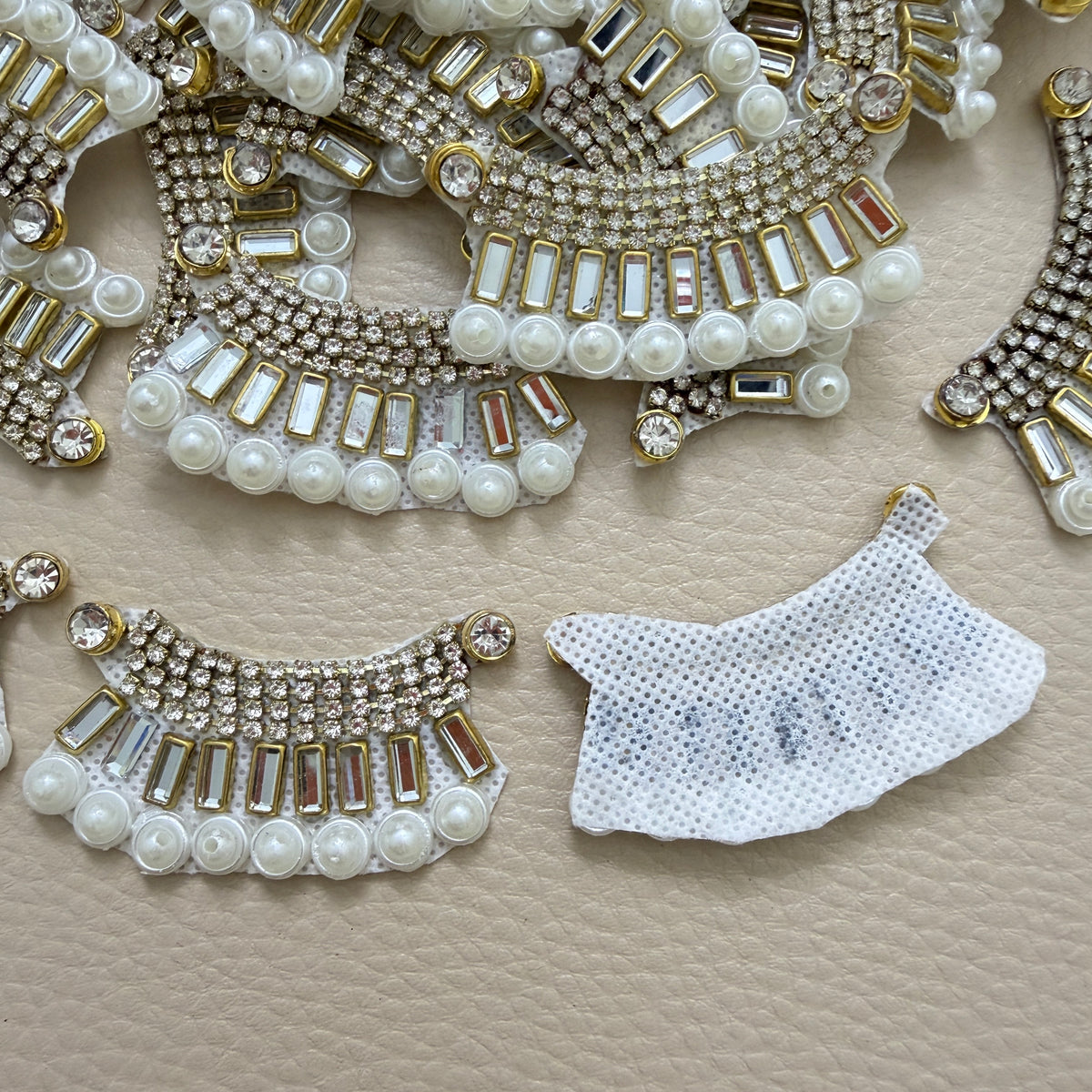 Group of matching rhinestone and pearl crescent craft patches