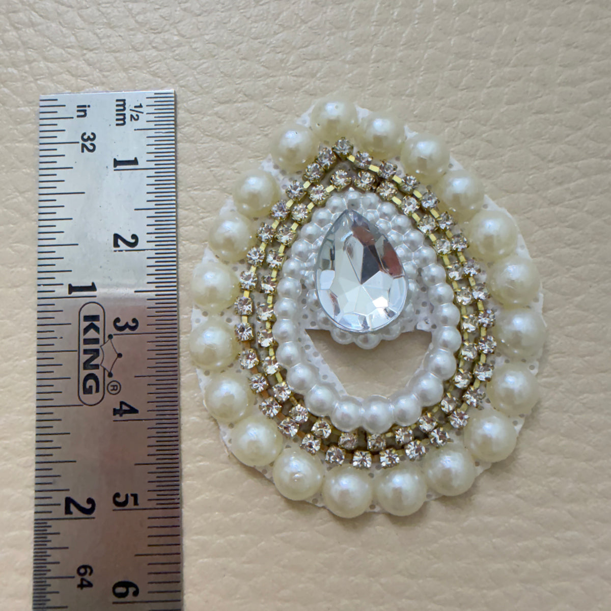 Group of matching pearl and rhinestone teardrop craft patches