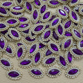 Purple marquise stone patches with white pearl-look beads and gold-tone rhinestone borders