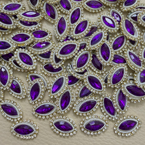 Purple marquise stone patches with white pearl-look beads and gold-tone rhinestone borders