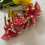 Fan tassel latkans laid flat with yellow flowers showing detail