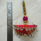 Single fan tassel latkan next to ruler showing approx 18cm length