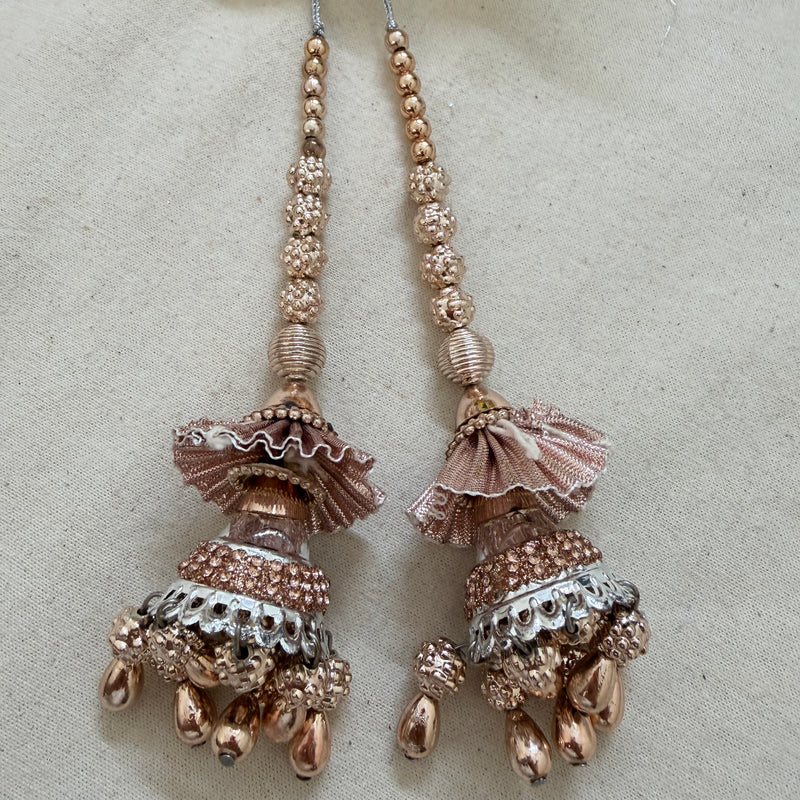 Rose Gold Jhumka Tassel with ruler showing 14 inch length
