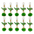Green Parrot Pom Pom Tassel with ruler showing approx 8cm length