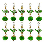 Green Parrot Pom Pom Tassel with ruler showing approx 8cm length