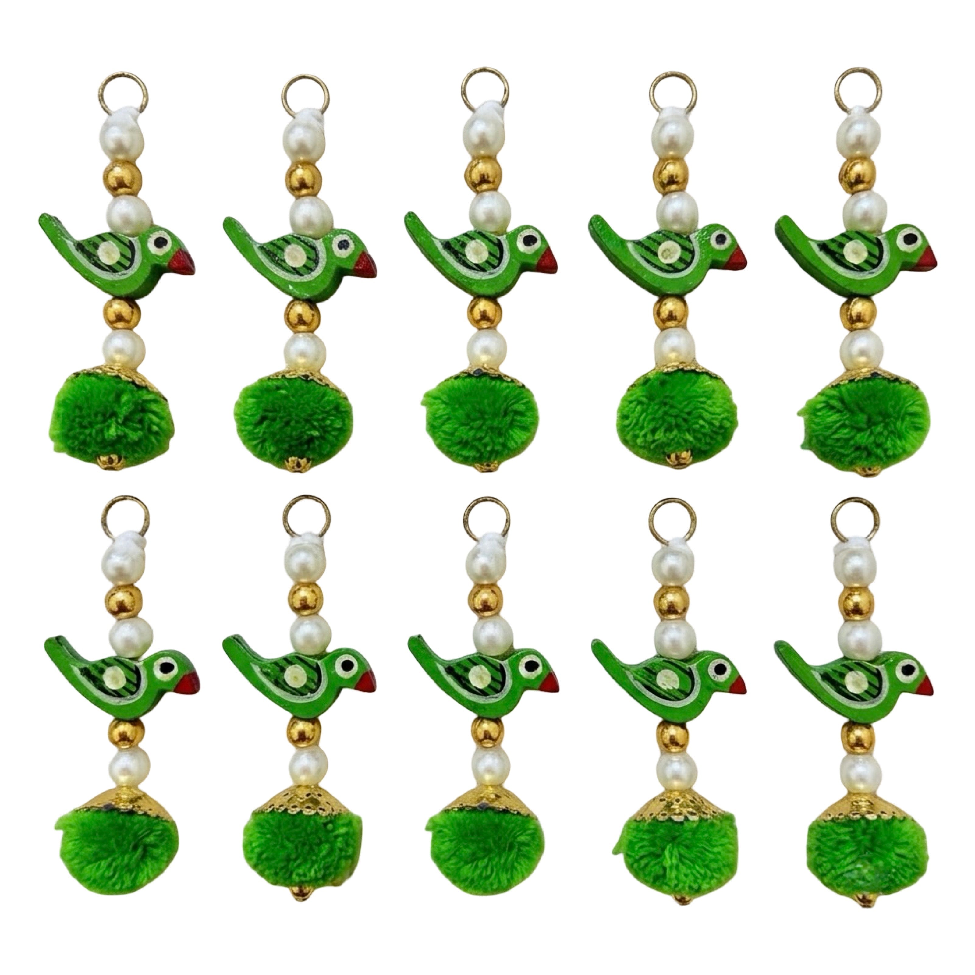 Green Parrot Pom Pom Tassel with ruler showing approx 8cm length