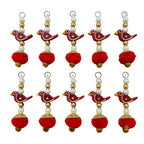 Pack of 10 Red Bird Pom Pom Tassels on white background