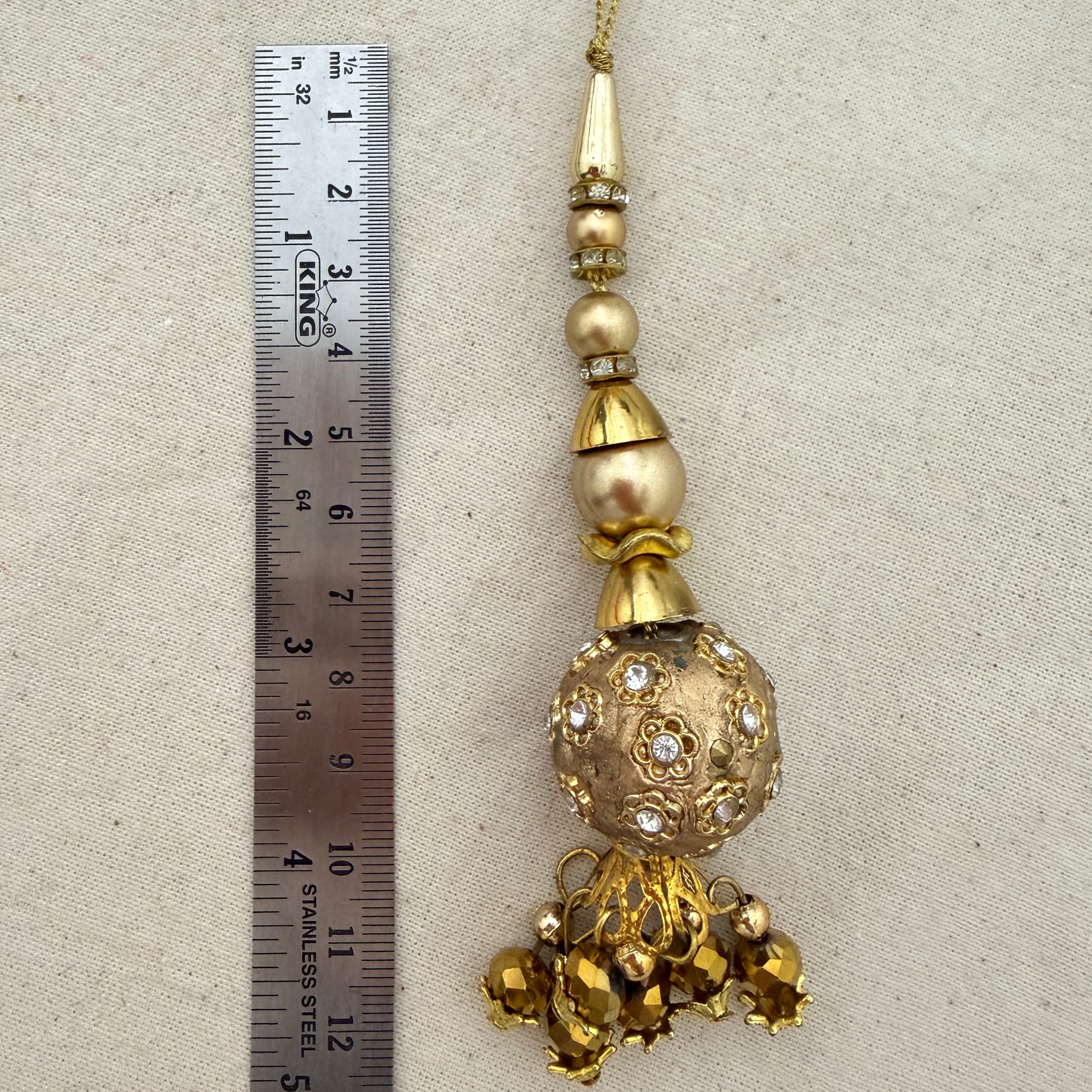 Rhinestone Floral Ball Latkan with ruler showing approx 12cm length