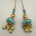 Pair of turquoise and gold-tone beaded latkan tassels with dangling charms, SKU TSL1224