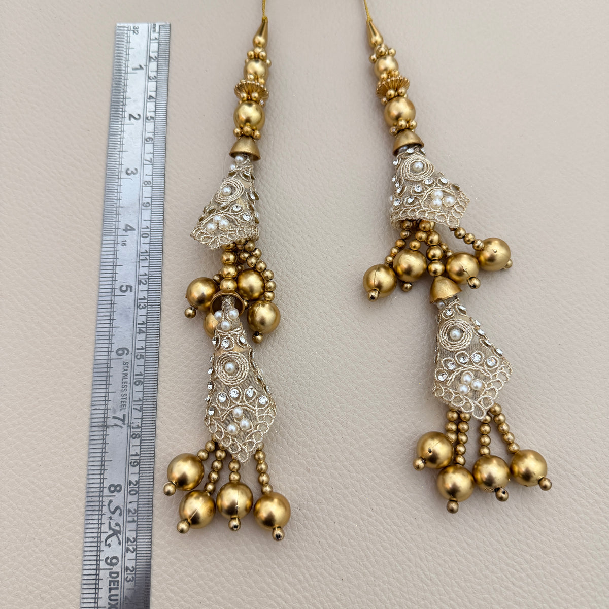 Group of gold-tone cone latkan tassels with beaded strands; sold in packs of 2