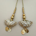 Pair of ivory and gold umbrella latkan tassels with pearl-look beads and dangling coin charms