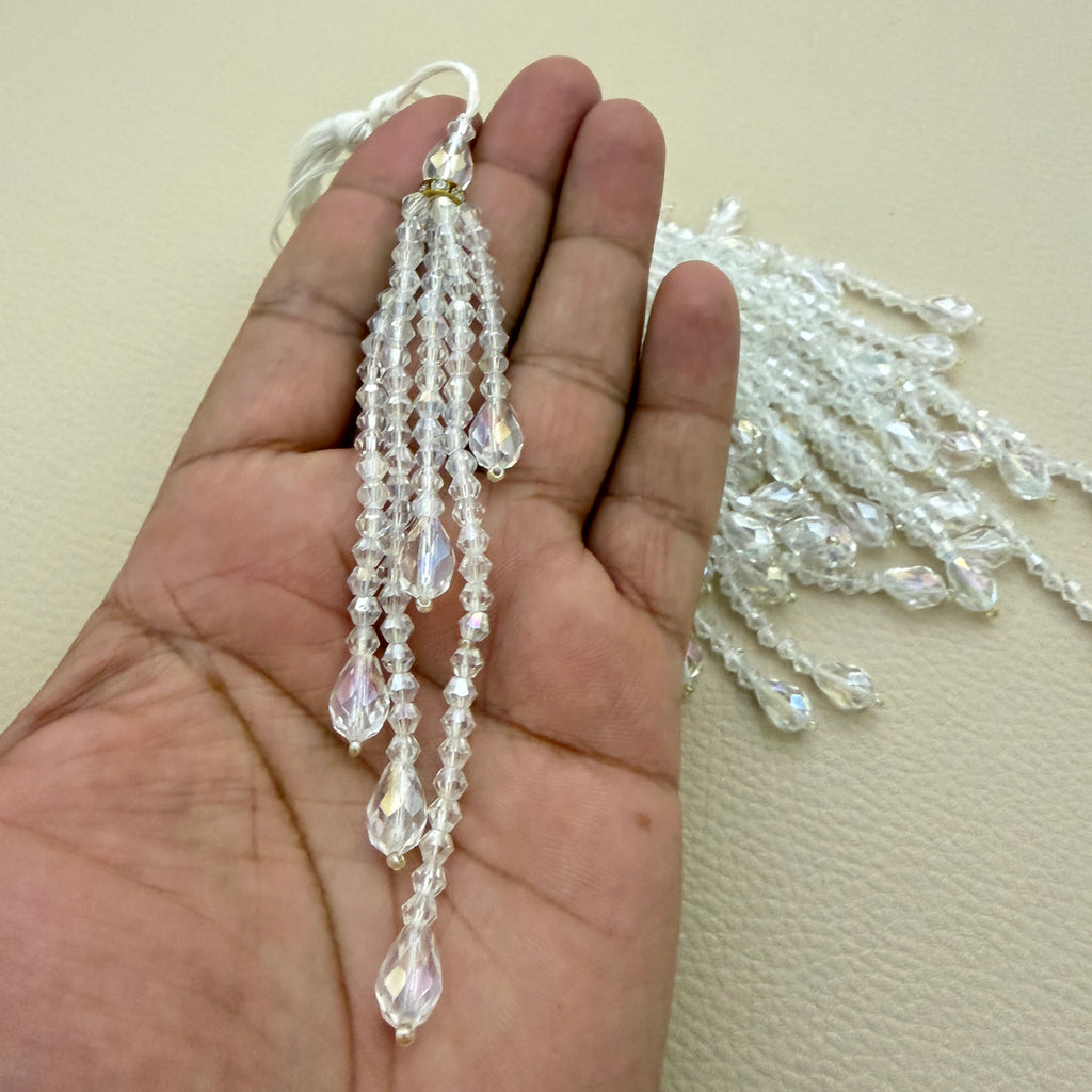 Group of clear beaded latkan tassels with gold-tone accents; sold in packs of two