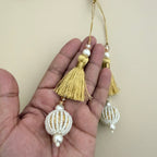 Pair of gold thread latkan tassels with white pearl-look beaded ball pendants