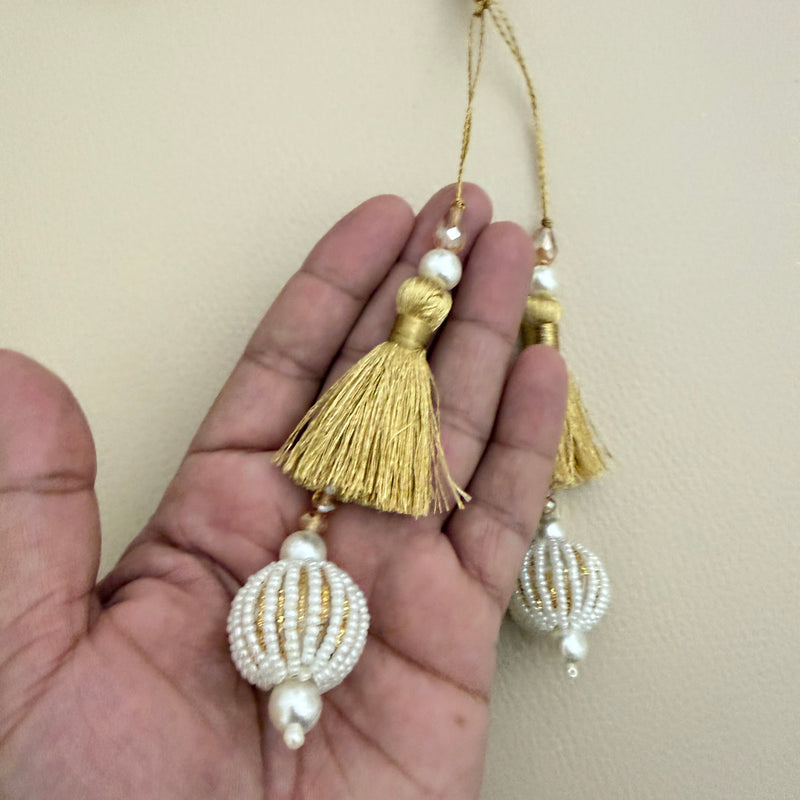 Pair of gold thread latkan tassels with white pearl-look beaded ball pendants